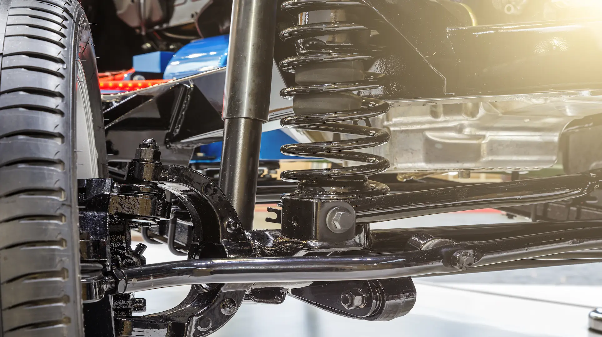 Vehicle suspension assembly on a lift