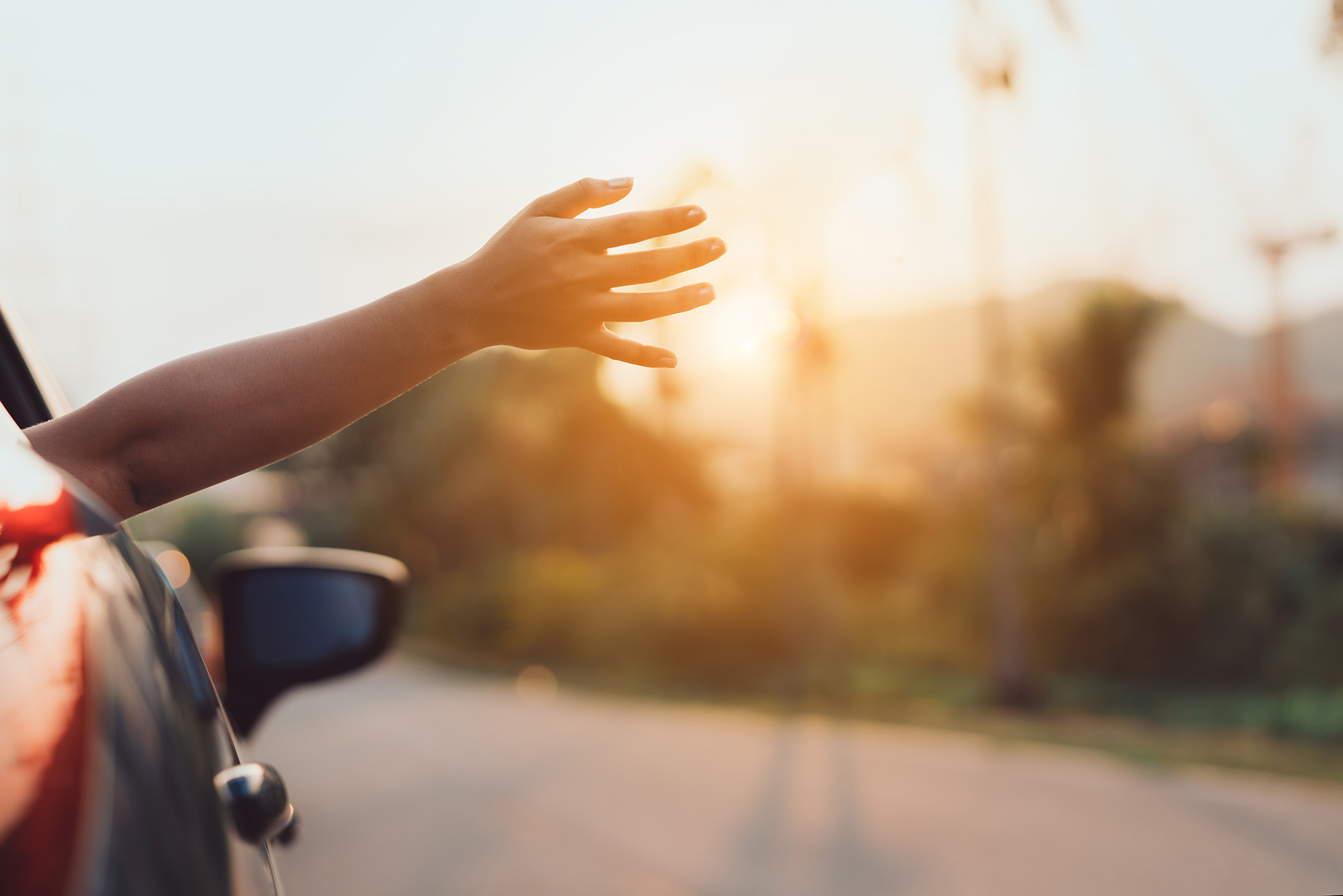 Technician road-testing a customer vehicle after a warranty-backed repair